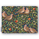 Navy Turtle Doves and Mistletoe Christmas tablecloth folded on white, showing turtle doves among mistletoe and red apples