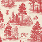 Close-up of the Fir Forest Toile Christmas napkin print in red on ivory cotton, showing fir trees and a rider