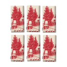 Village Toile Christmas napkins in red on ivory, set of six, folded on white, showing the same fir tree and snowy cottage