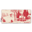 Village Toile Christmas table runner in red on ivory, folded on white, showing villagers and cottages in the snow