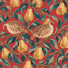 Close-up of the red Partridge and Pear Christmas napkin print on cotton, showing partridges among pears and leaves