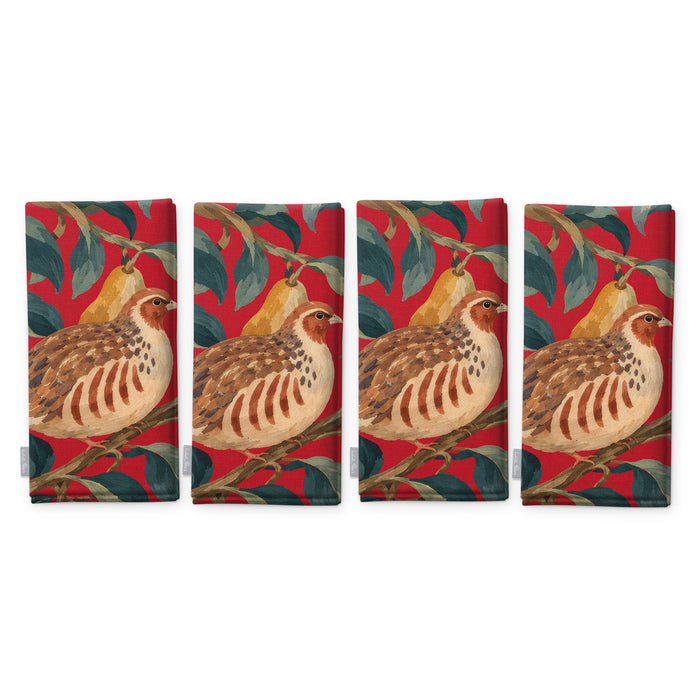 Red Partridge and Pear Christmas napkins, set of four, folded on white, showing the same partridge among pears