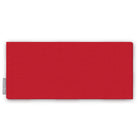 Plain red cotton Christmas table runner folded on white