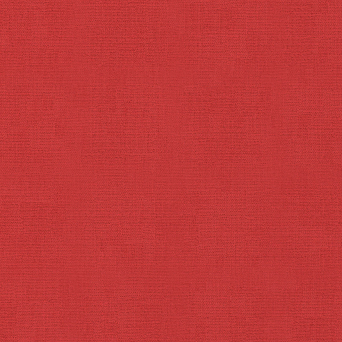 Close-up of the plain red cotton Christmas tablecloth, showing the weave