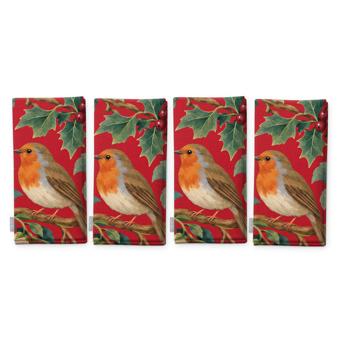 Red Robins and Christmas Roses Christmas napkins, set of four, folded on white, showing the same robin under a sprig of holly