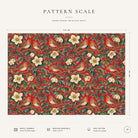 Pattern scale of the Robins and Christmas Roses Christmas tablecloth in red across its 144 cm width, with care notes