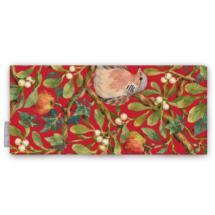 Red Turtle Doves and Mistletoe Christmas table runner folded on white, showing a turtle dove among mistletoe and red apples