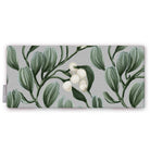 Mistletoe Christmas table runner in silver grey, folded on white, showing sprigs of mistletoe with white berries