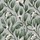 Close-up of the Mistletoe table runner print in silver grey on cotton, showing sprigs of mistletoe with white berries