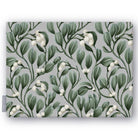 Mistletoe Christmas tablecloth in silver grey, folded on white, showing sprigs of mistletoe with white berries