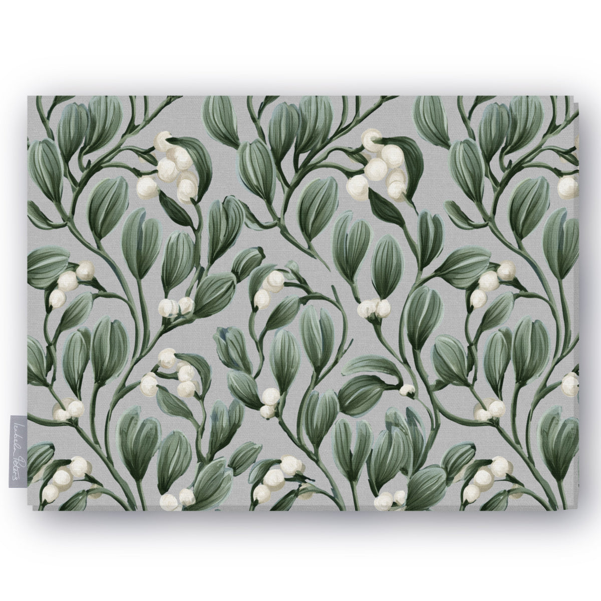 Mistletoe Christmas tablecloth in silver grey, folded on white, showing sprigs of mistletoe with white berries