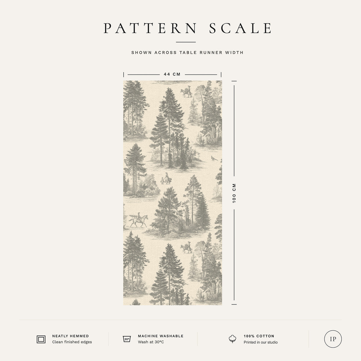 Pattern scale of the Fir Forest Toile Christmas table runner in silver grey on ivory across its 44 cm width, with care notes