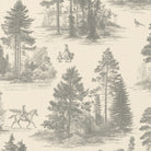 Close-up of the Fir Forest Toile Christmas table runner print in silver grey on ivory cotton, showing fir trees and a rider