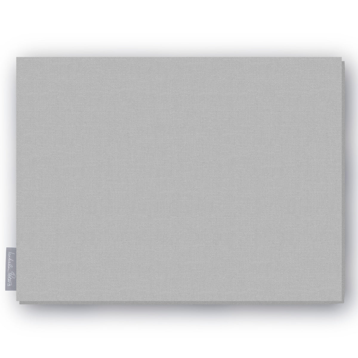 Plain silver cotton Christmas tablecloth folded on white