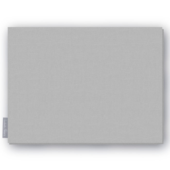 Plain silver cotton Christmas tablecloth folded on white
