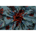 Floral Display velvet fabric in Orange Rust On Teal