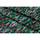 Floral Meadow velvet fabric in Violet On Shades Of Forest Green