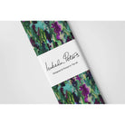 Floral Meadow velvet fabric in Violet On Shades Of Forest Green
